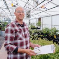 Jackson Gross in a Greenhouse